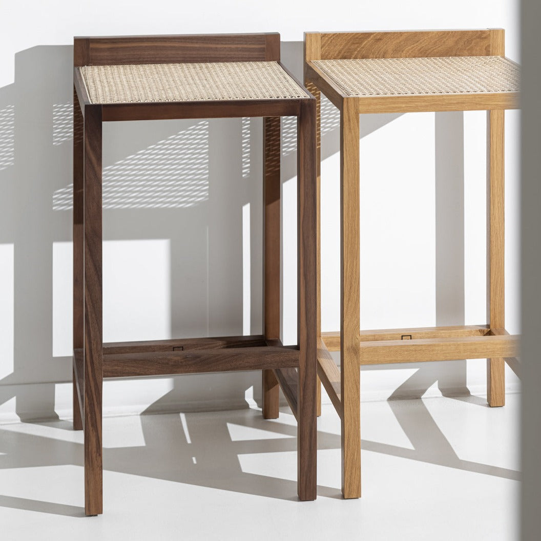 Porventura Alto stool with wooden seat and metal frame, modern design, shown from a side angle.