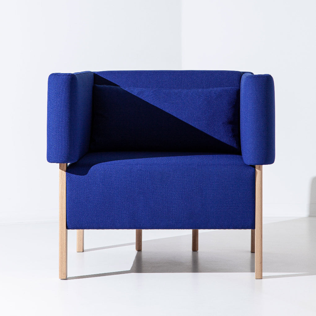 signed by Filipa Aguiar & João Pereira, the COD armchair pairs an exposed beech wood frame with soft upholstery. Its balanced proportions and clean lines bring warmth and a refined presence to contemporary interiors.