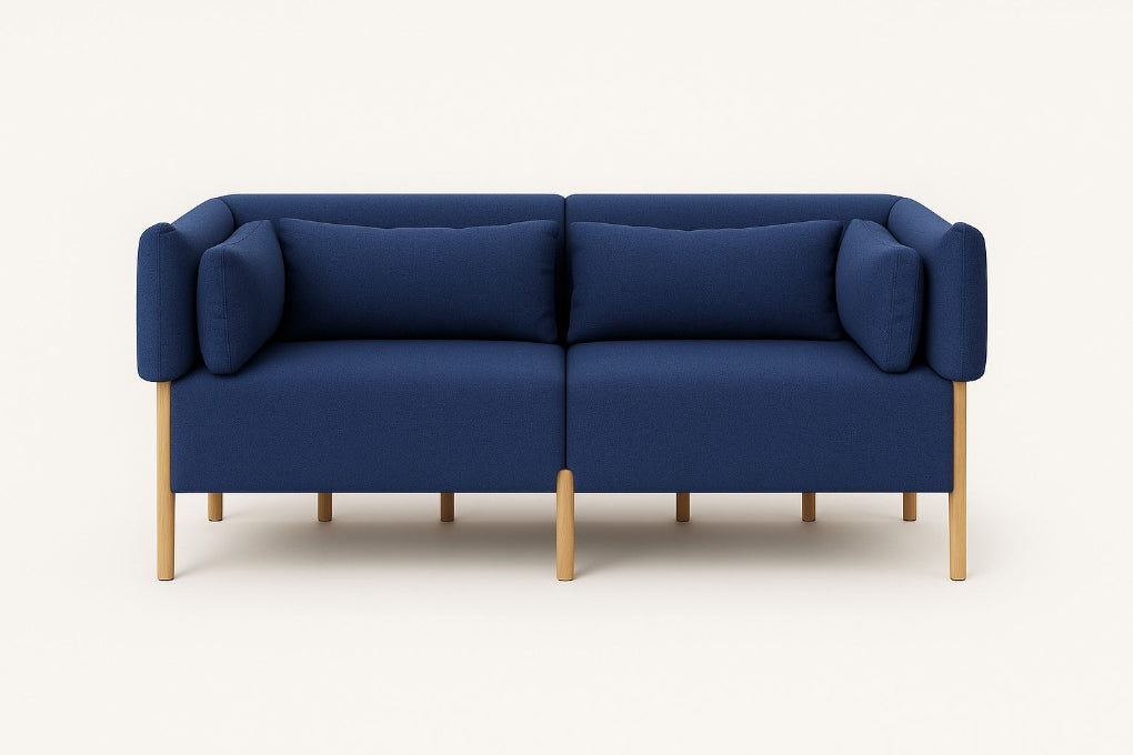 The COD sofa by Porventura, designed by Filipa Aguiar & João Pereira, pairs an exposed beech wood frame with Camira ERA Perennial – Blue upholstery. Its contemporary design, balanced proportions and soft cushions create an inviting centrepiece for a modern living space.