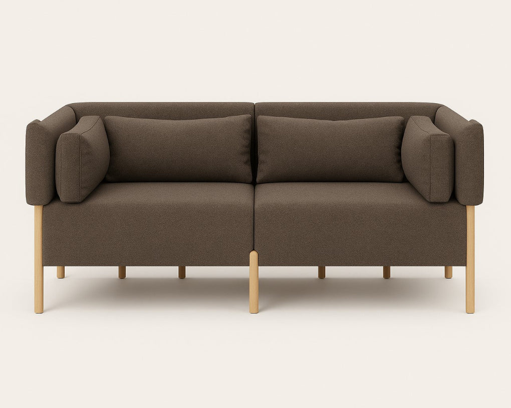 The COD sofa by Porventura, designed by Filipa Aguiar & João Pereira, pairs an exposed beech wood frame with Camira ERA History – Olive upholstery. Its contemporary design, balanced proportions and soft cushions create an inviting centrepiece for a modern living space.