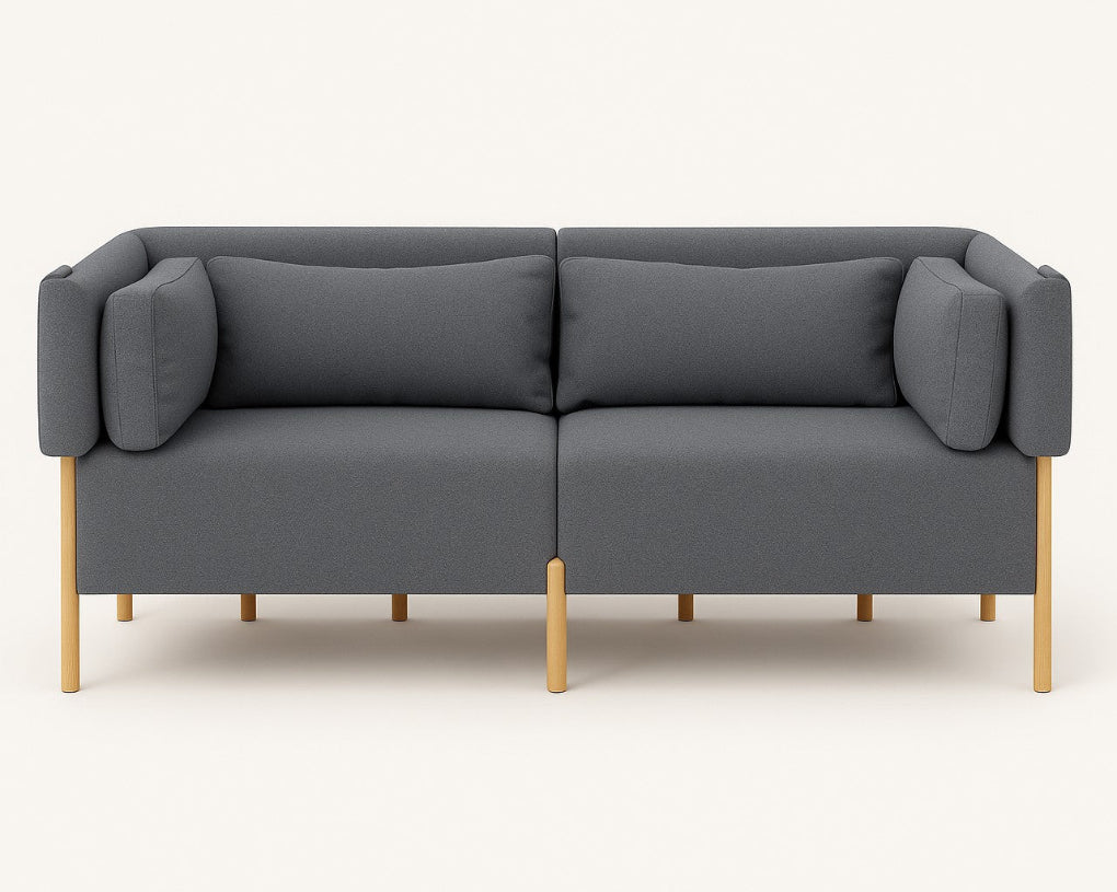 The COD sofa by Porventura, designed by Filipa Aguiar & João Pereira, pairs an exposed beech wood frame with Camira ERA Present – Dark Grey upholstery. Its contemporary design, balanced proportions and soft cushions create an inviting centrepiece for a modern living space.