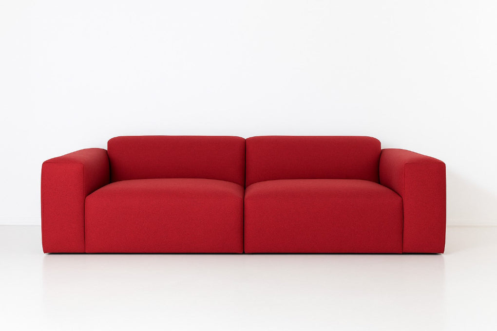 Porventura DEEP modular sofa, upholstered in red Camira Era Cycle fabric, with a contemporary design that brings comfort and a relaxed character to living spaces.