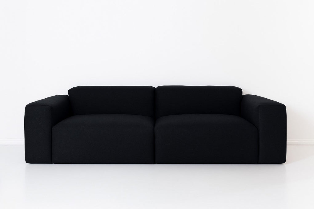 Porventura DEEP modular sofa, upholstered in black Camira Era Forward fabric, with a contemporary design that brings comfort and a relaxed character to living spaces.