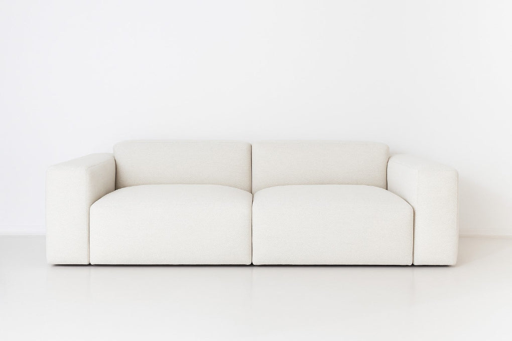 Porventura DEEP modular sofa, upholstered in white Camira Era Transition fabric, with a contemporary design that brings comfort and a relaxed character to living spaces.