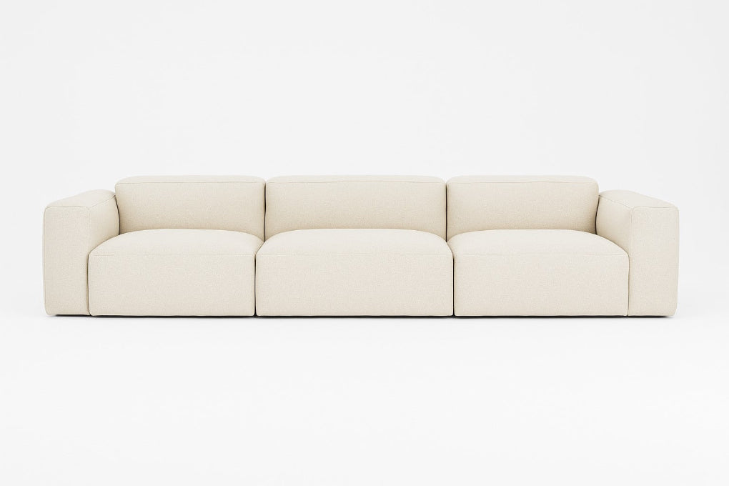 Porventura DEEP three-seater modular sofa, upholstered in white Camira Era Transition fabric, with a contemporary design that brings comfort and a relaxed character to living spaces.