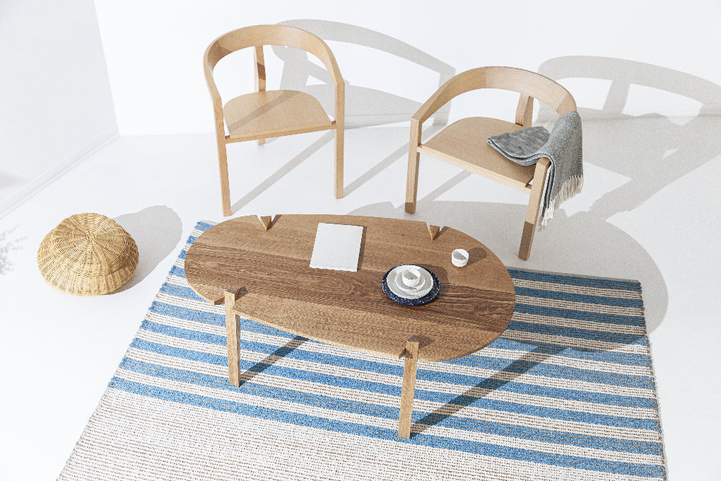Cátia Moura Fenda coffee table with sleek design and smooth finish, featuring a modern, minimalist style in a contemporary living room setting.