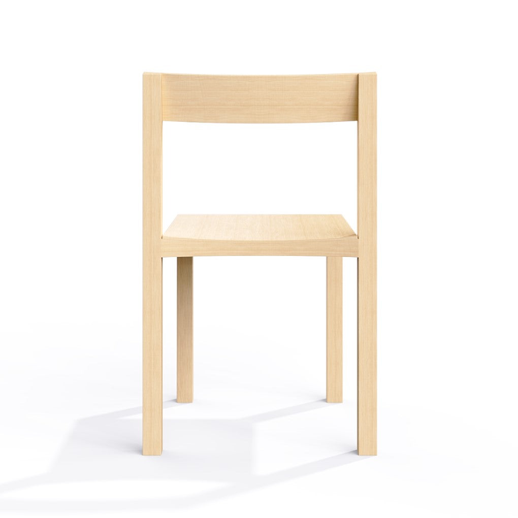 Elegant formal chair by JBNG Studio with a sleek design and cushioned seat, perfect for sophisticated living or office spaces.