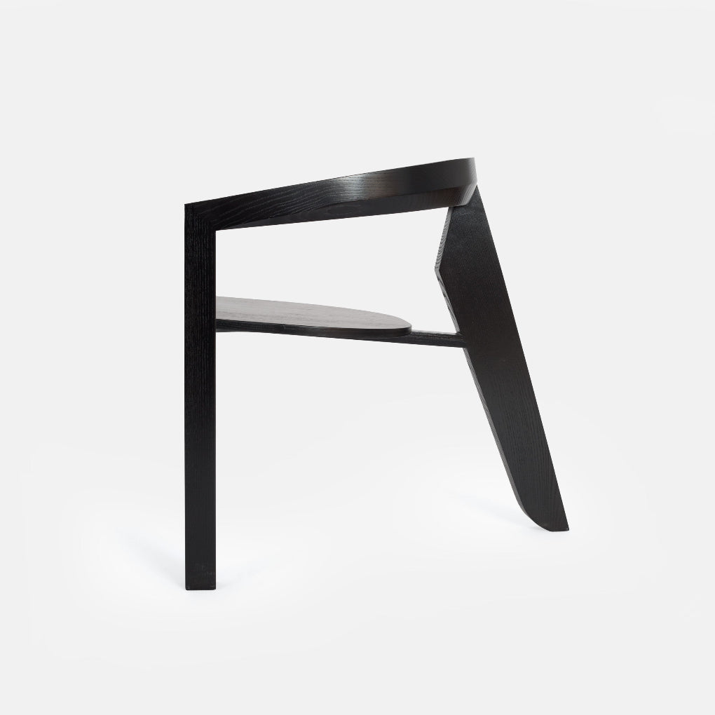 The ICON LOUNGE chair by Porventura in black-painted ash combines clean, contemporary lines with a comfortable seat.