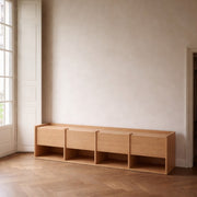 Filipe Ventura MIES L sideboard in oak veneer, with a sleek finish, modern design, and spacious storage, shown in a contemporary living space.