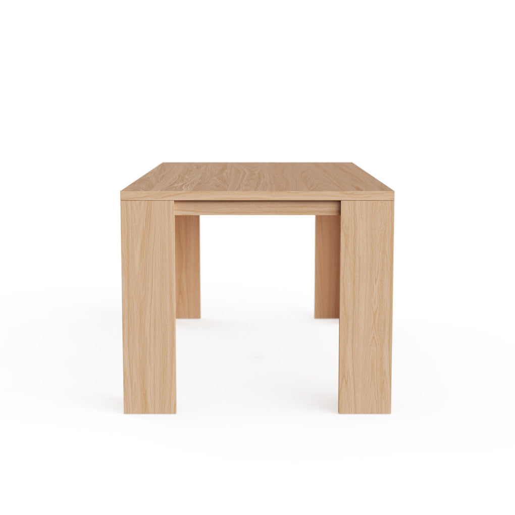 Porventura MONTE table, featuring a sleek wooden surface and contemporary design, shown from a side angle that highlights its refined craftsmanship and elegant construction.