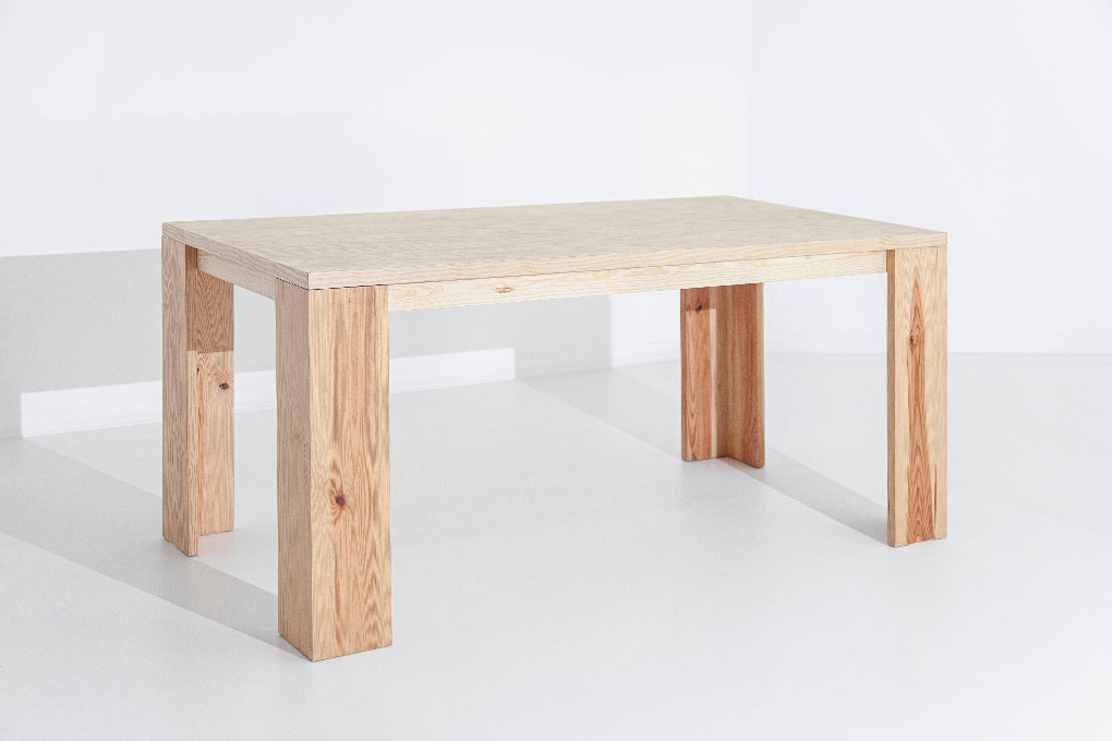 Porventura MONTE table, featuring a sleek wooden surface and a contemporary design defined by clean lines, refined craftsmanship, and understated elegance.