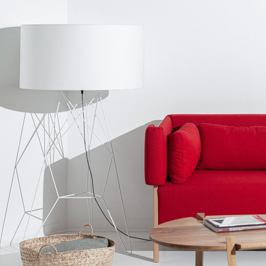 Porventura Tension lighting fixture with sleek modern design, featuring adjustable arm and minimalist style for contemporary interiors.