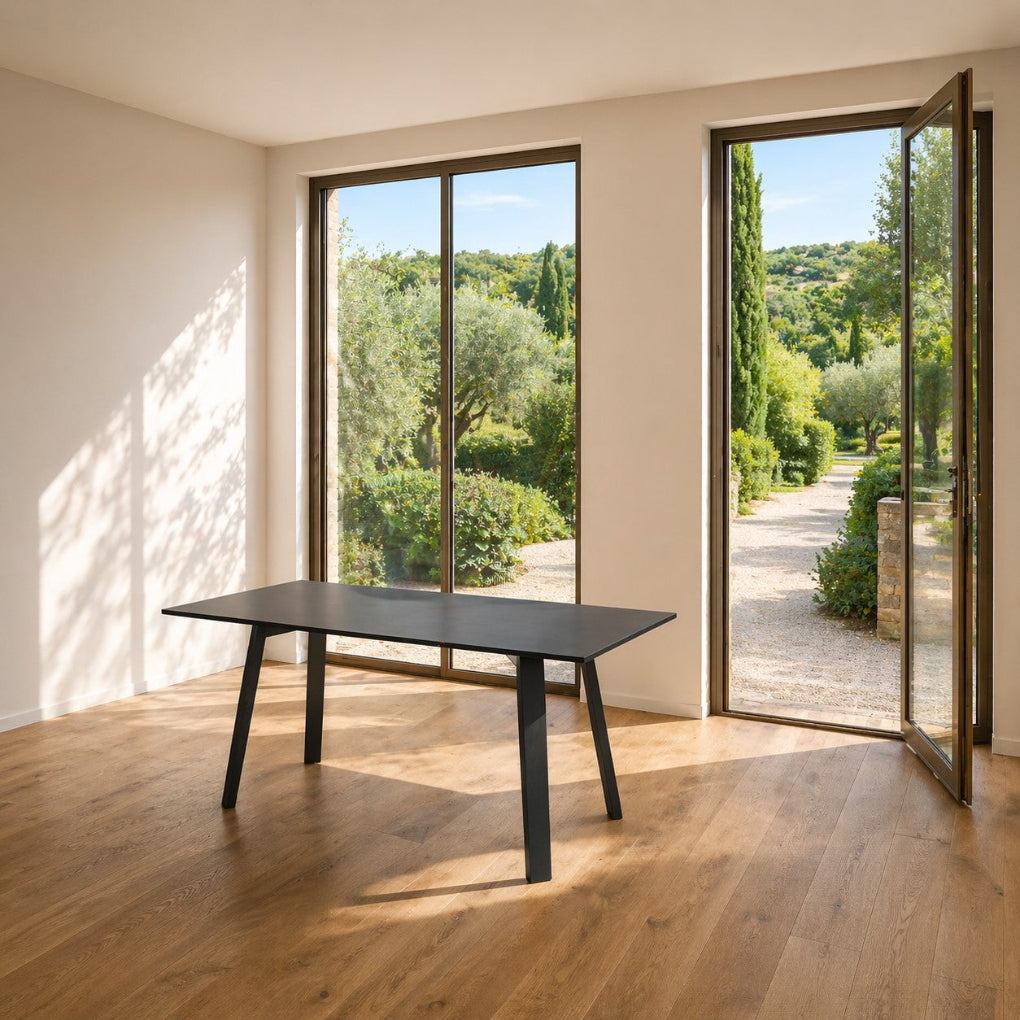 Porventura FLAT table, crafted from oak wood in natural, ash white-painted or ash black-painted finishes, with clean lines and balanced proportions that highlight its understated contemporary design.