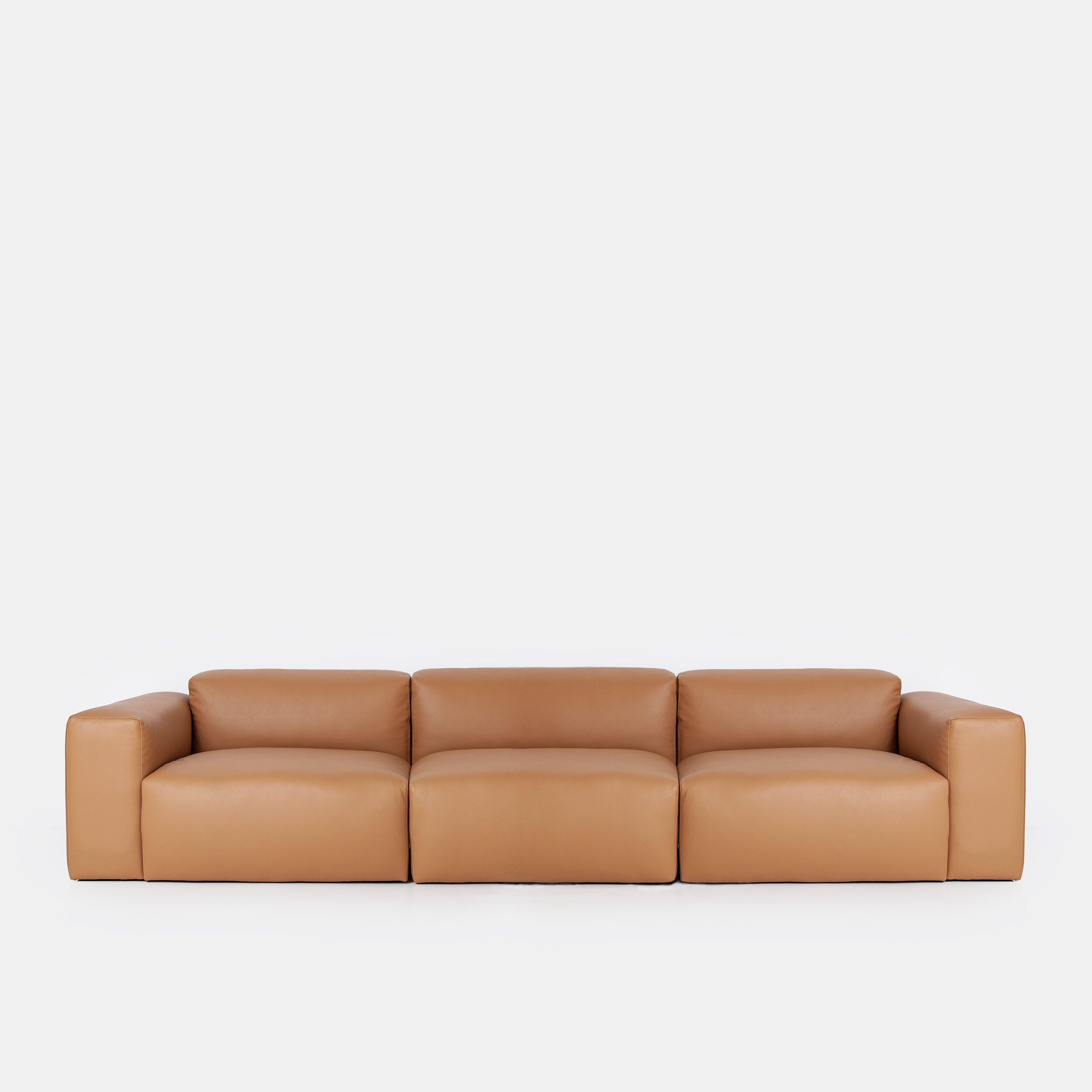 Porventura Deep sofa with plush cushions and modern design, shown in a cozy living room setting.