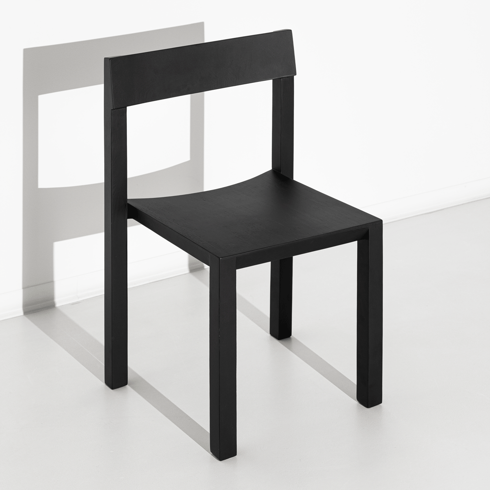 JBNG Studio formal chair with sleek design, featuring a cushioned seat and modern wooden legs for elegant office or dining use.