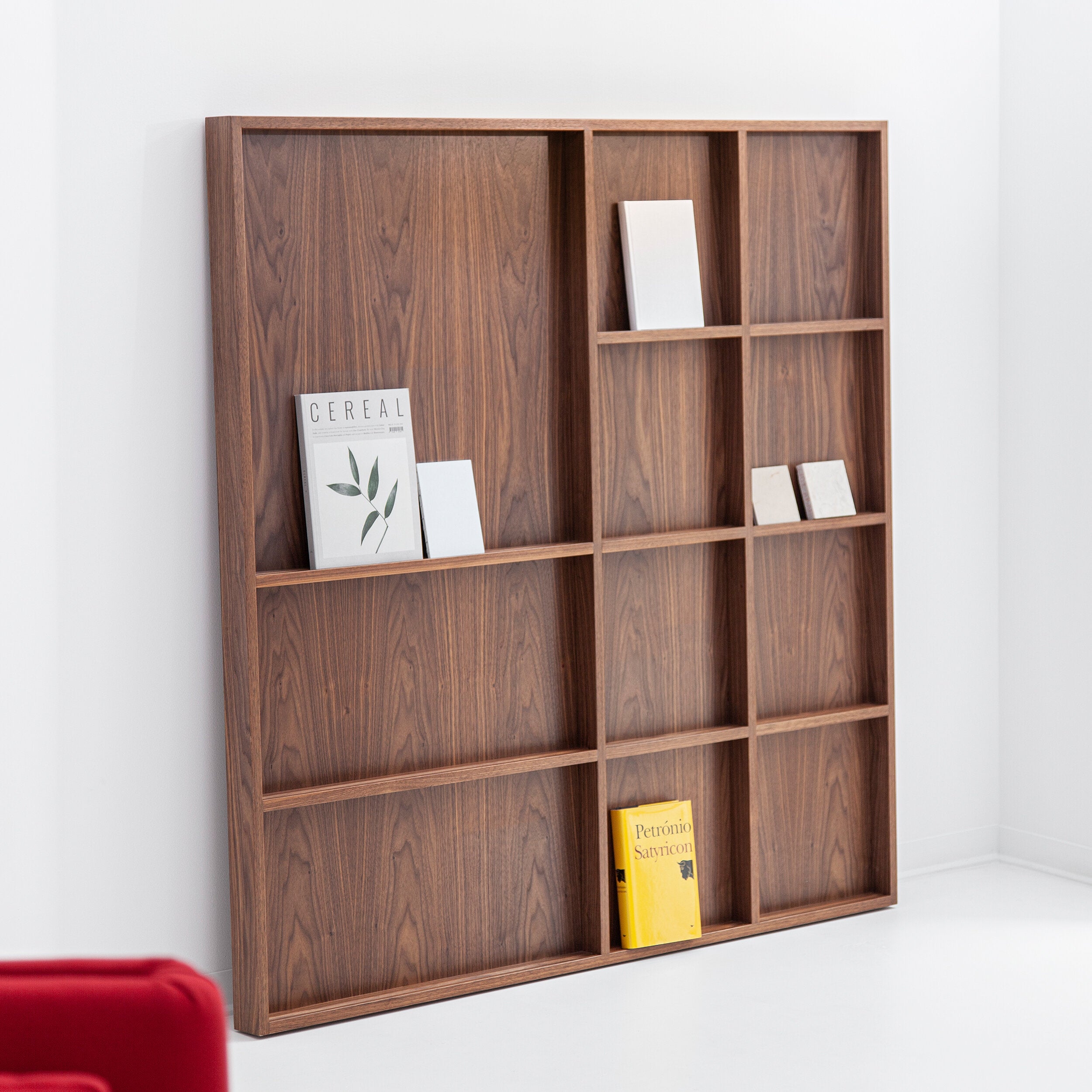Porventura Atlas shelving unit with multiple wooden shelves and metal frame, modern storage solution for home or office.