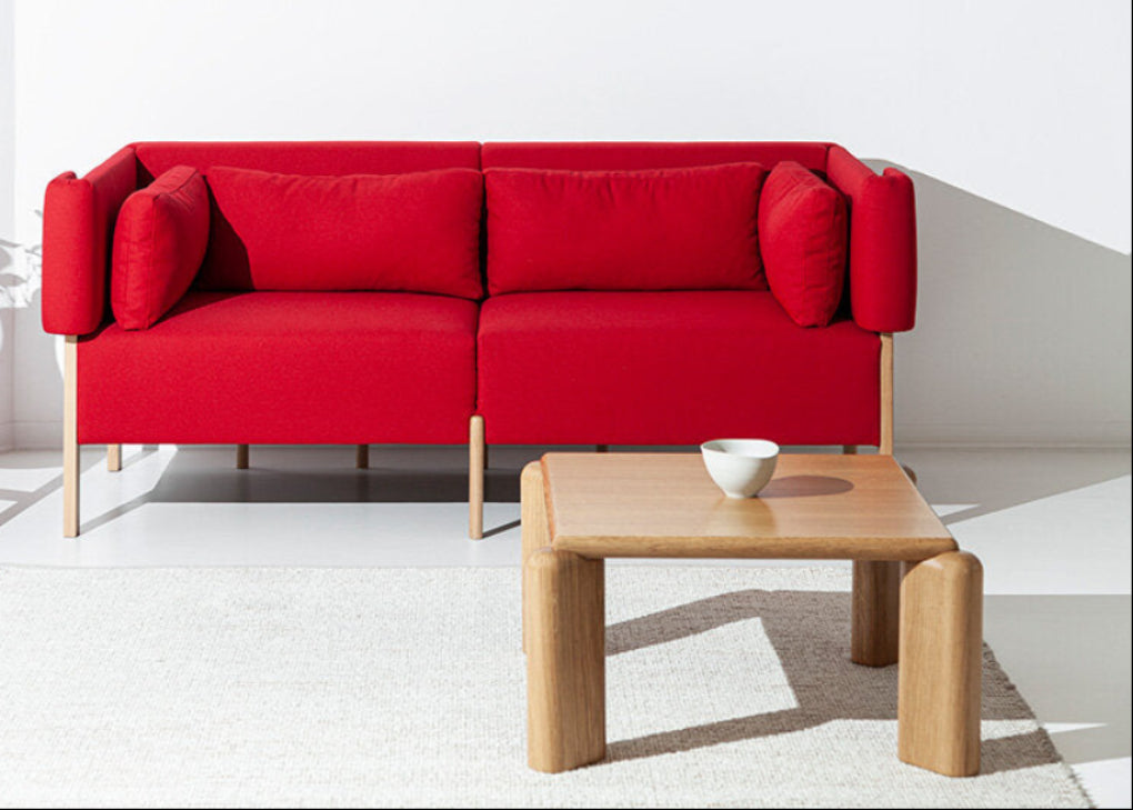 Designed by Filipa Aguiar & João Pereira for Porventura, the COD sofa combines the natural warmth of an exposed beech wood frame with the softness of upholstered cushions. A considered balance of structure and comfort gives the piece a distinctive presence in contemporary interiors.