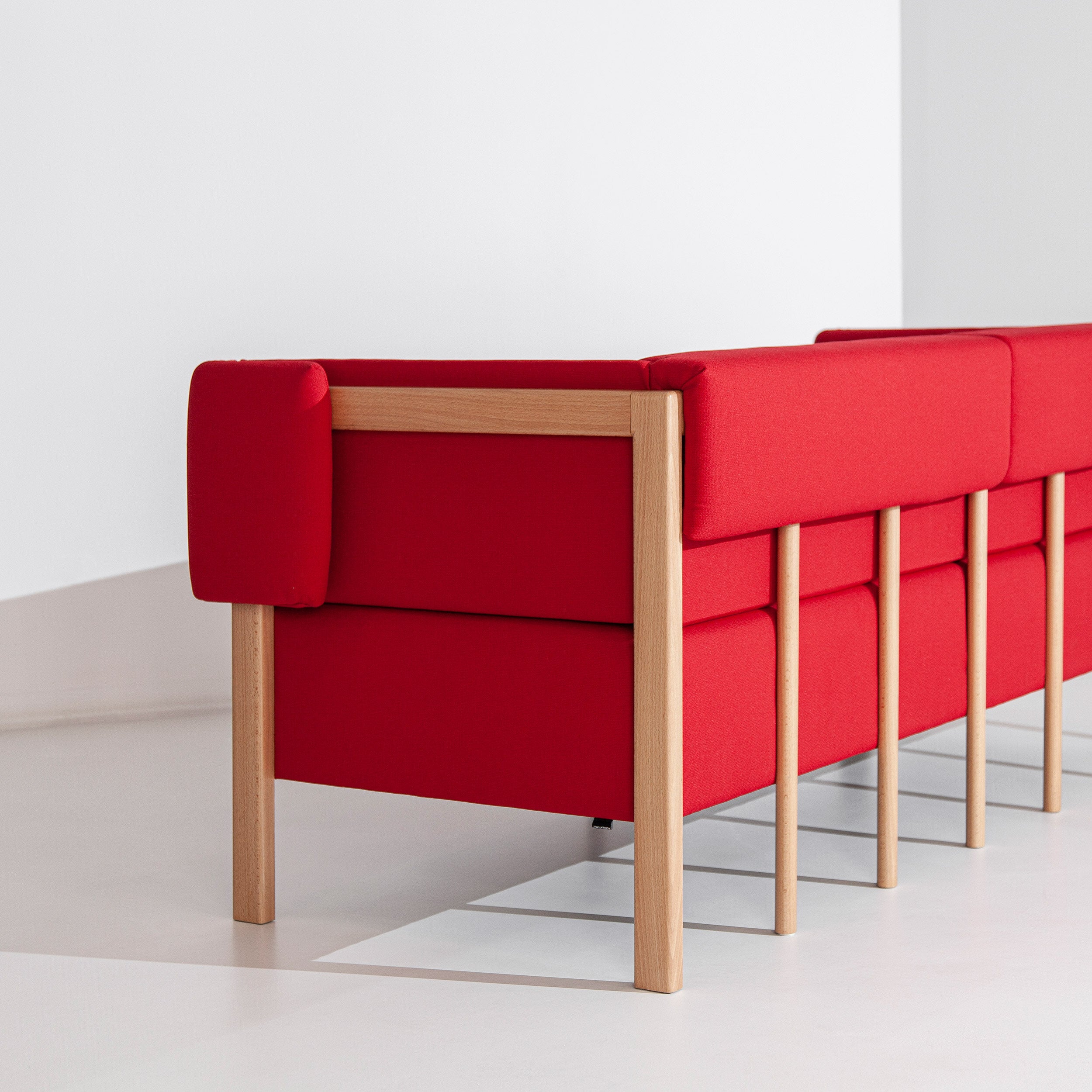 Porventura Cod three-seater sofa with plush fabric and modern design, shown in a cozy living room setting.