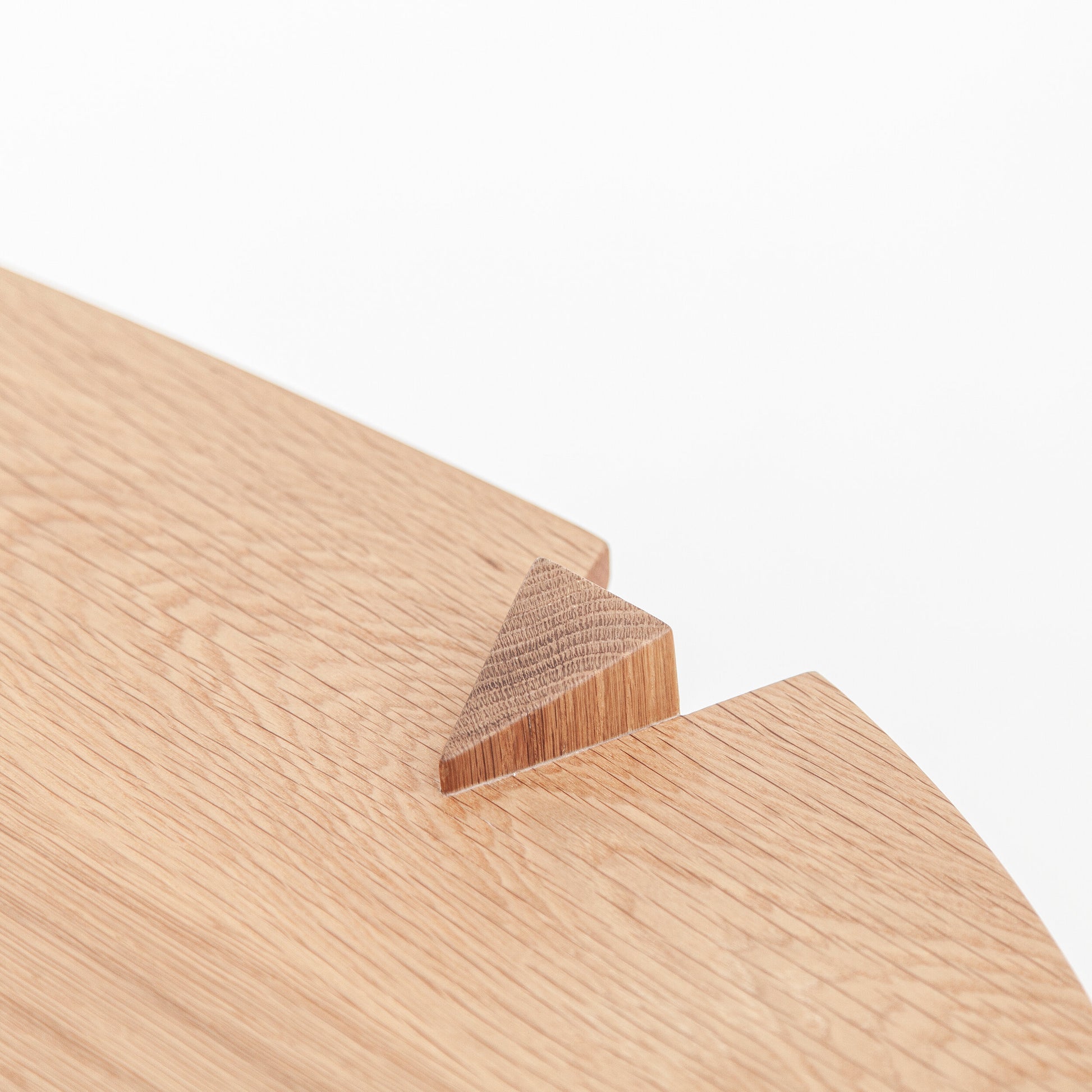 Modern Cátia Moura Fenda coffee table with sleek design and wood finish, shown from a top-down view.