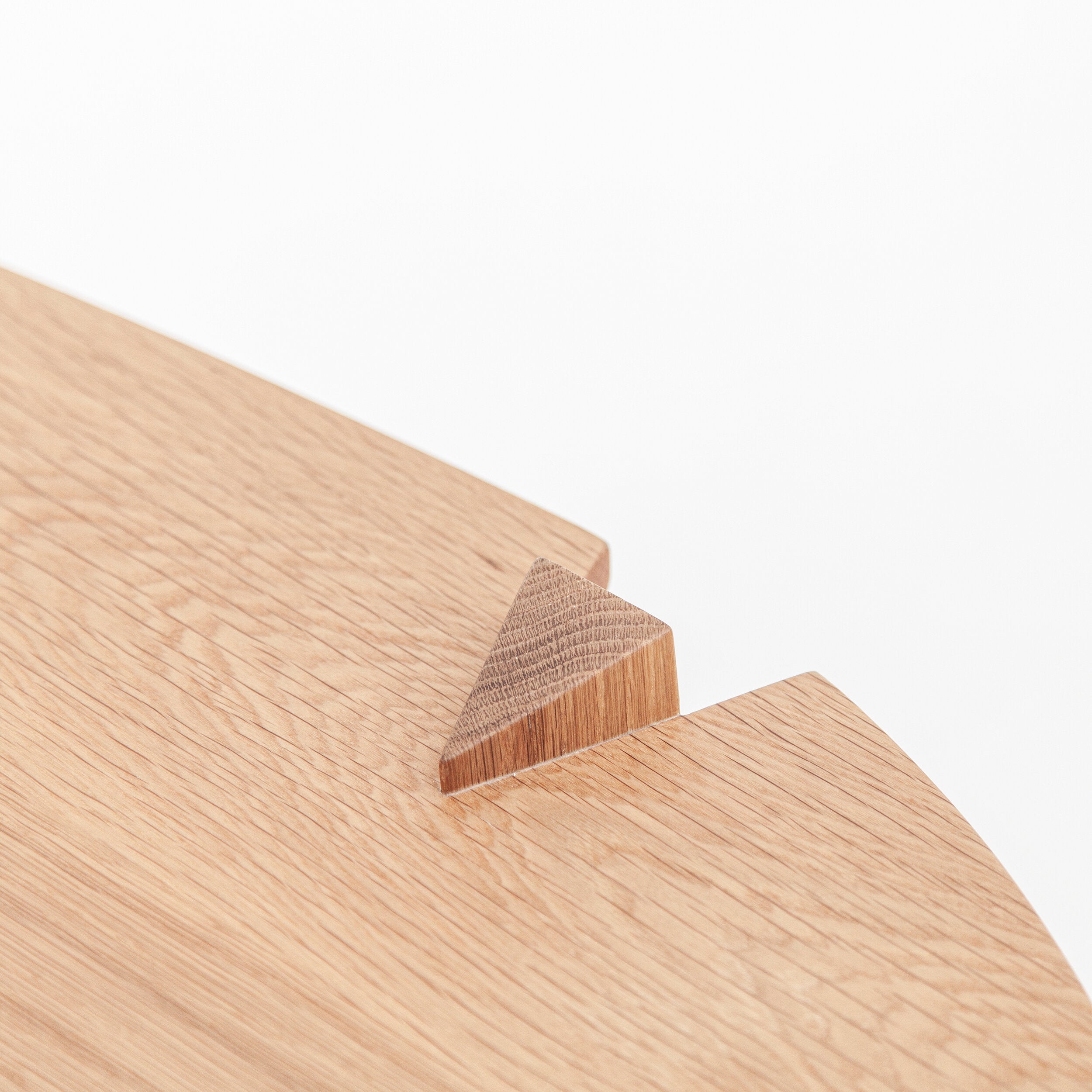 Modern Cátia Moura Fenda coffee table with sleek design and wood finish, shown from a top-down view.