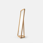Porventura LAZY mirror in solid oak, featuring a sleek, modern design shown from a side perspective, highlighting its elegant shape and refined craftsmanship.