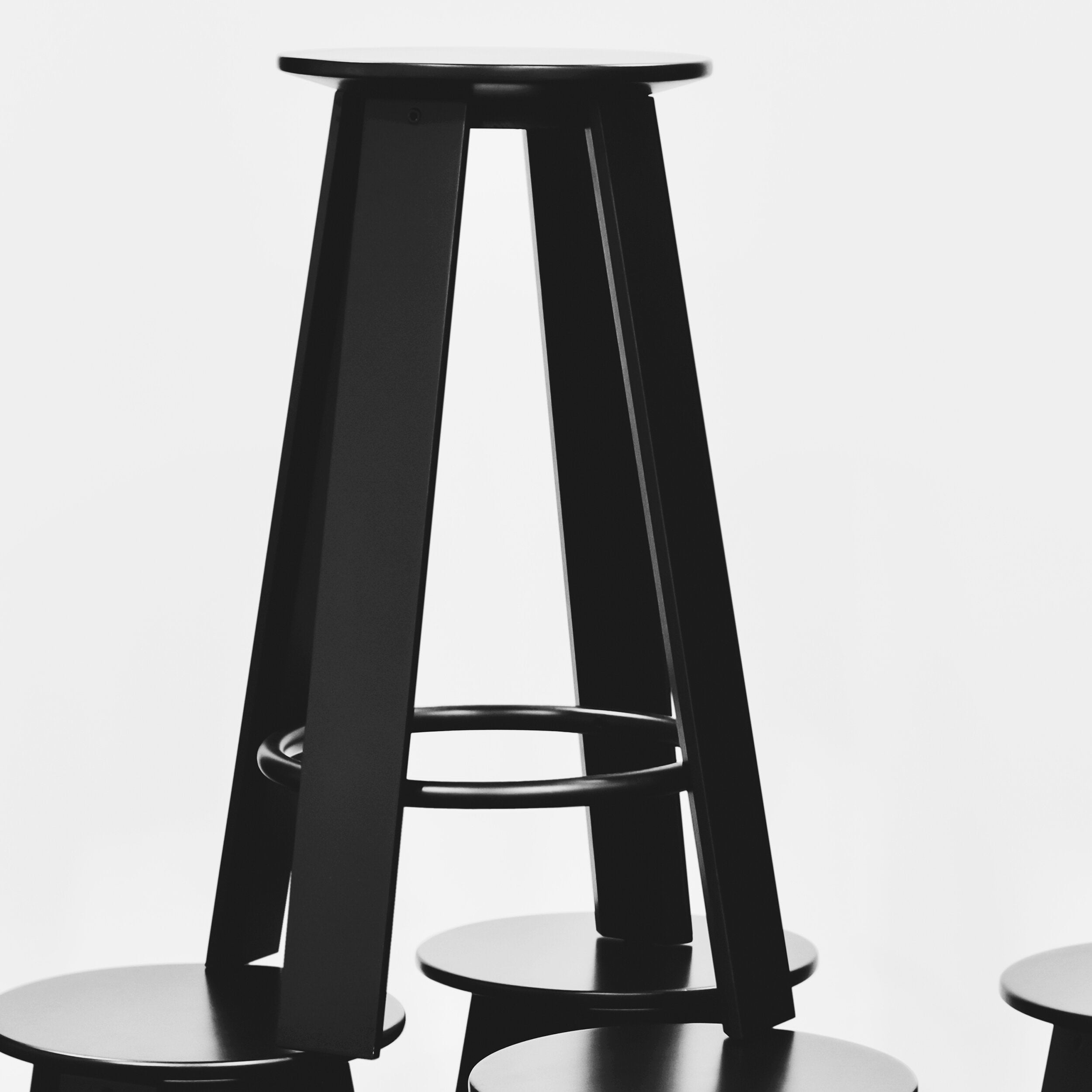 Porventura Linear stool with sleek wooden seat and metal legs, modern design ideal for contemporary interiors.