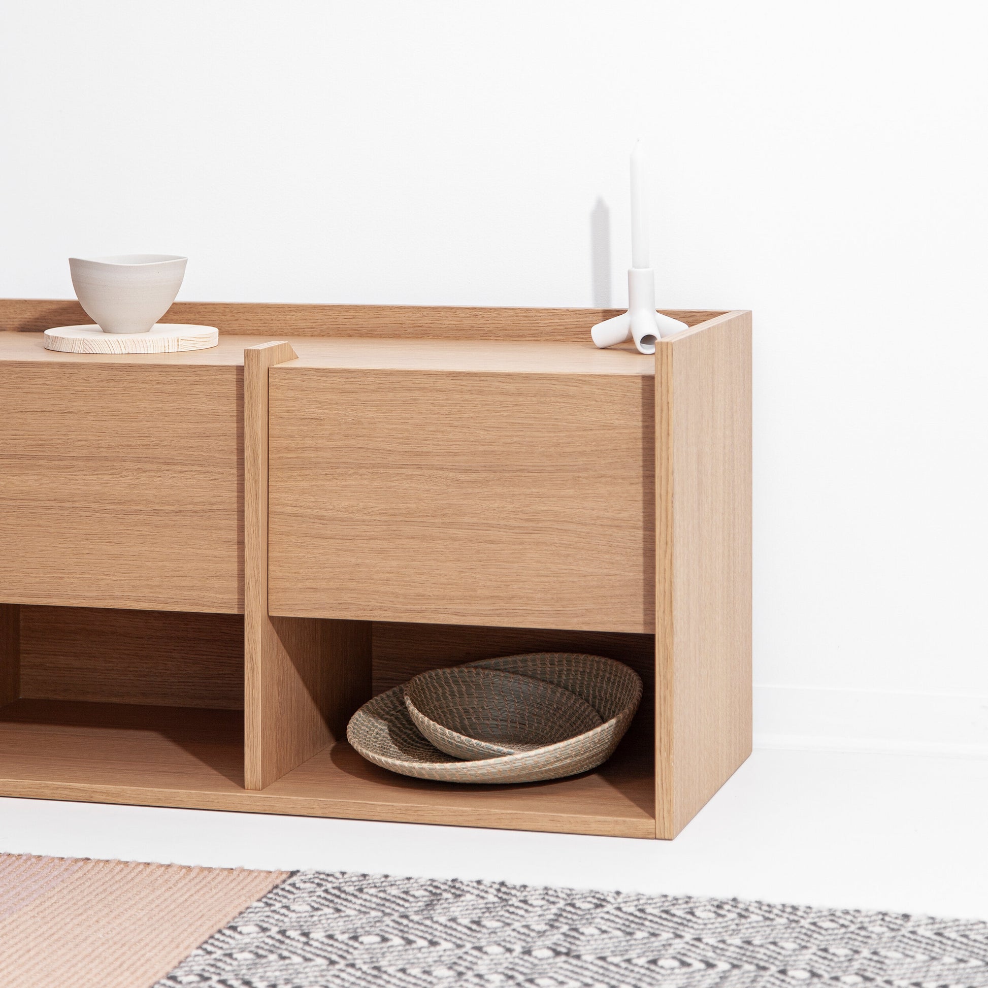 Filipe Ventura Mies L sideboard with sleek wood finish, modern design, and spacious storage drawers in a contemporary living space.