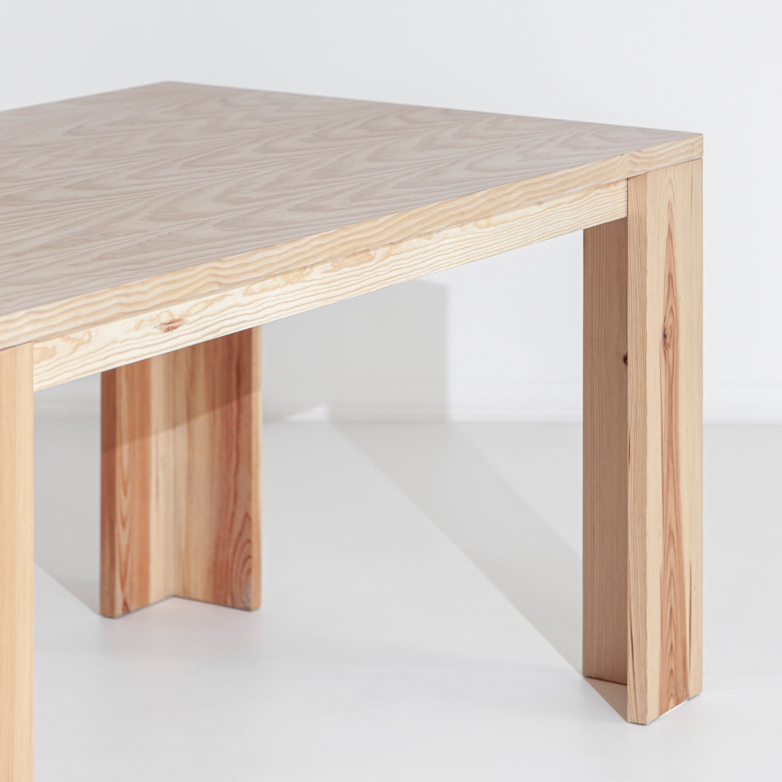 Porventura Monte table showing a modern wooden design with a smooth surface and sturdy legs.