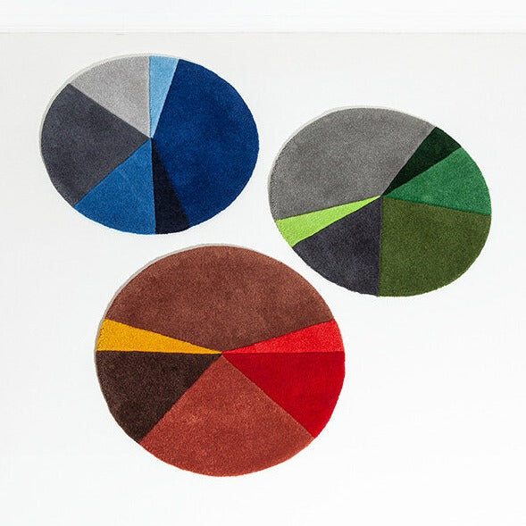Porventura rug featuring a modern geometric pattern in neutral tones, showcasing soft fabric and stylish design.