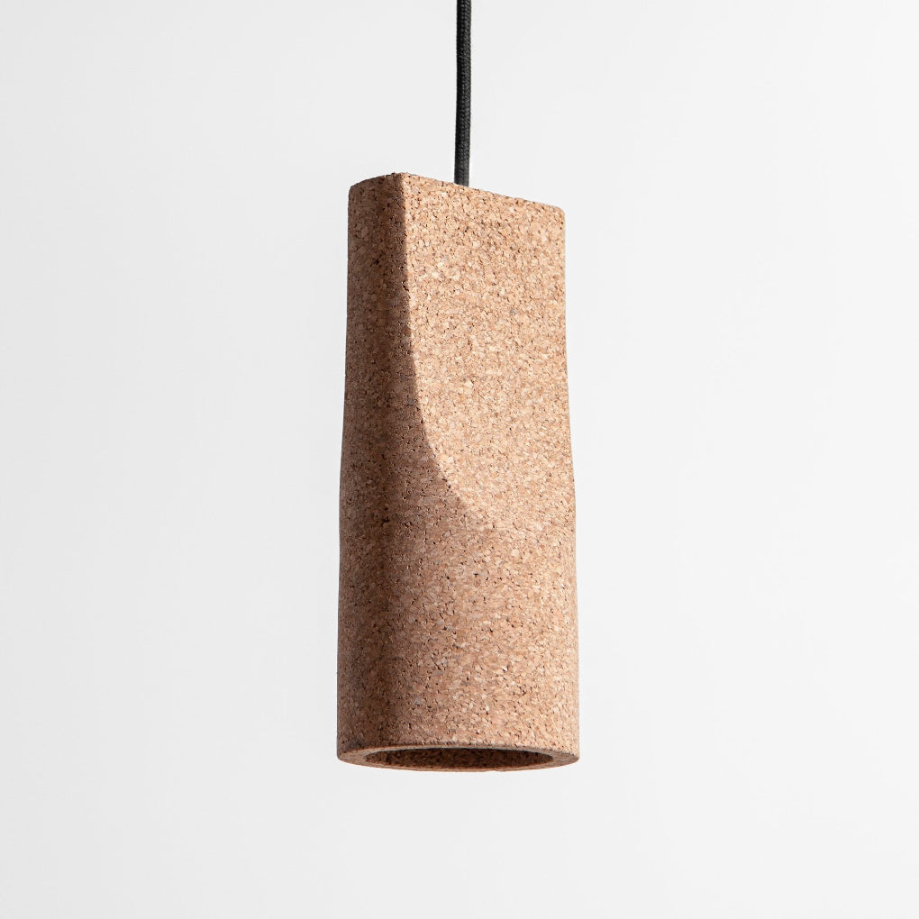 ventura SLICE lighting fixture crafted from cork, featuring a minimalist form that highlights the natural texture and distinctive character of the material.