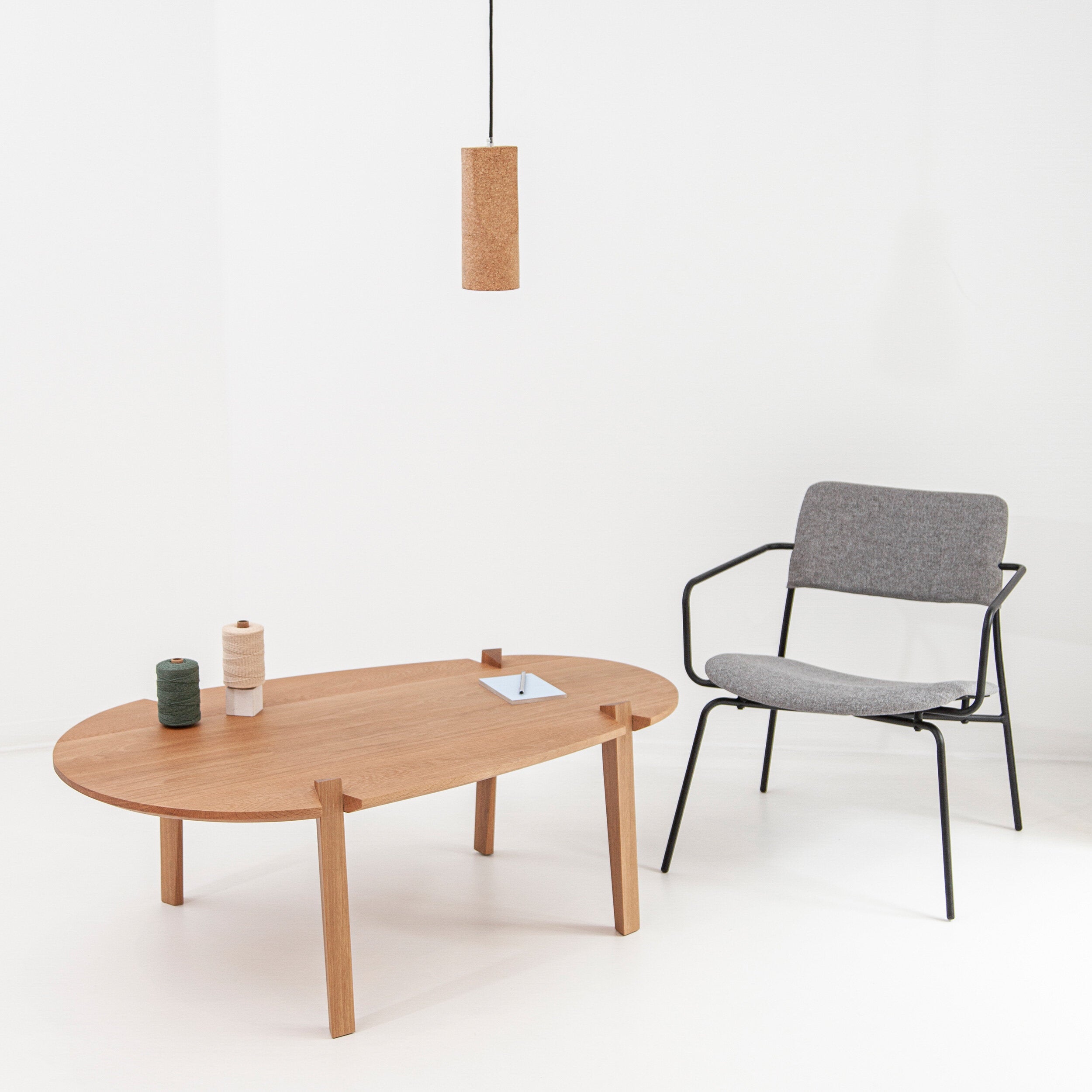 Porventura Slice lighting fixture with sleek, modern design and smooth white finish, showcasing its minimalist style.