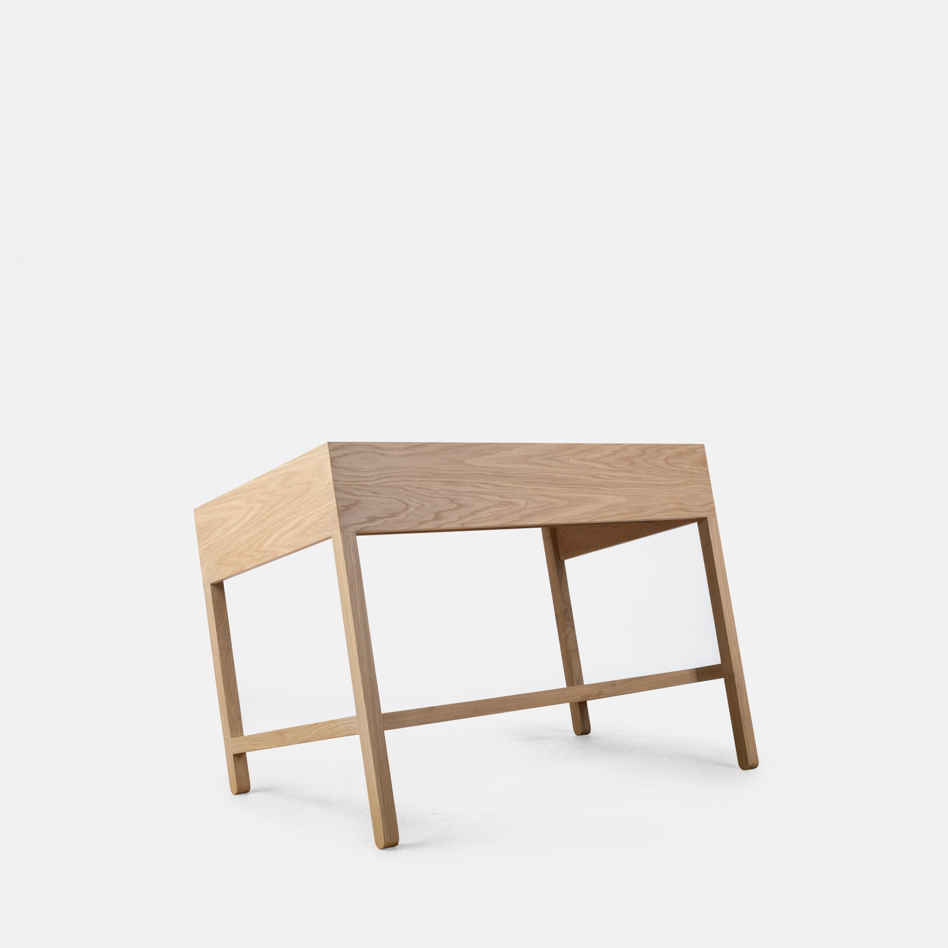 Miguel Soeiro Torta table with a sleek, modern design, shown from the back perspective in a high-resolution image.