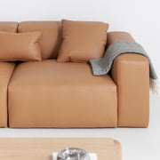 Porventura Deep sofa with plush cushions and modern design, shown in a cozy living room setting.